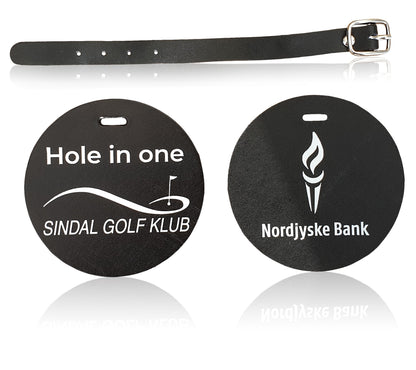 Bagmærke i sort læder med rem, rund